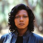 Resilience Defined: Queen Latifah Rose from Album Struggles to “Black Reign” & “U.N.I.T.Y.” Glory.